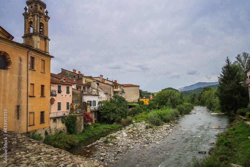 View of the river Magra and historical buildings in Pontremoli, Italy