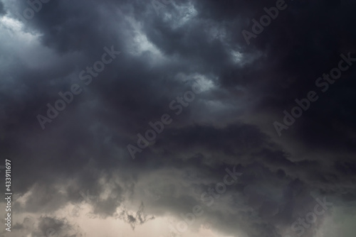 Dramatic sky background with dark rainy clouds before the storm.