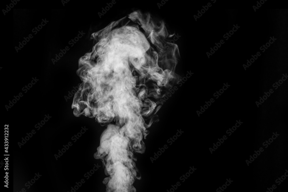Curly white steam, Fog or smoke isolated transparent special effect on black background. Abstract mist or smog background, design element for your image, Layout for collages. Curly white steam, Fog or smoke isolated transparent special effect on black background. Abstract mist or smog background, design element for your image, Layout for collages.