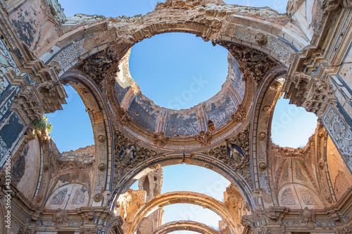Dome and roof of the Church falling in ruins of the old town of Belchite in the province of Zaragoza, Spain photo