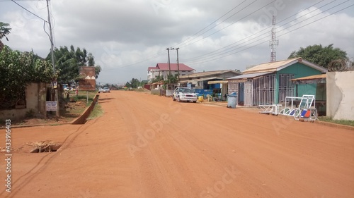 Sandy road somewhere in the city of Accra, Ghana.