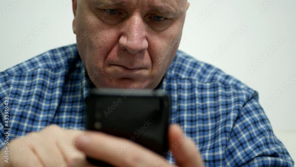 Businessman Use a Mobile Phone, Send Messages and Gesticulate Nervously and Disappointed Businessman Use a Mobile Phone, Send Messages and Gesticulate Nervously and Disappointed