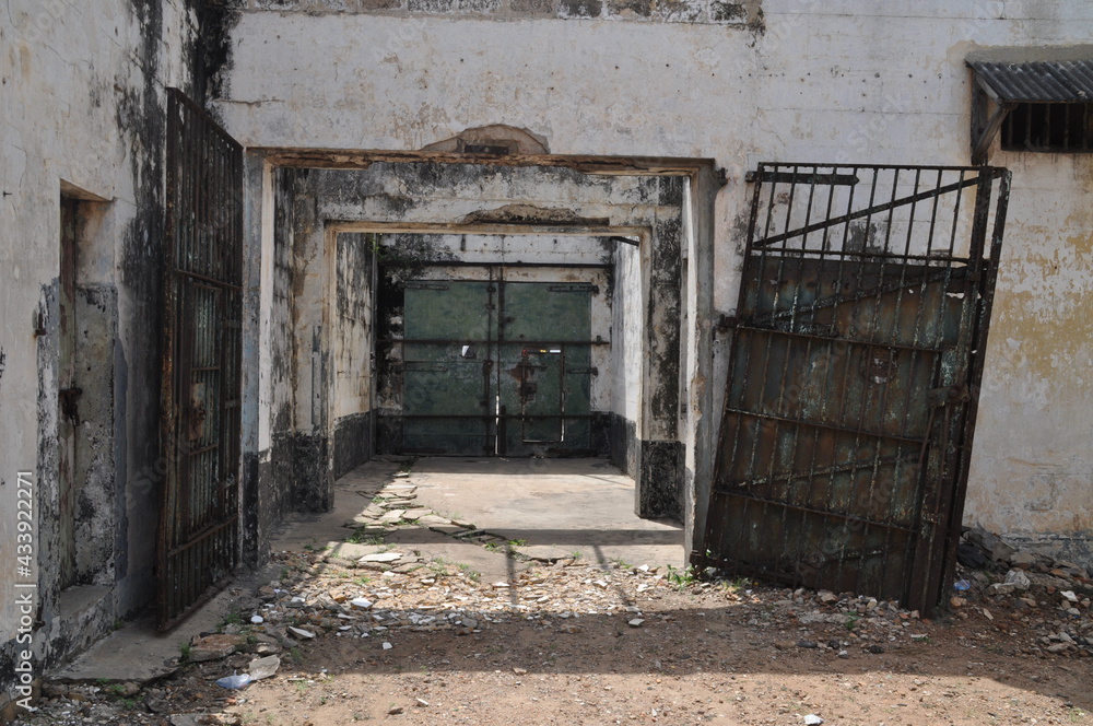 Gate of an abandoned prison in a fort in Ghana.