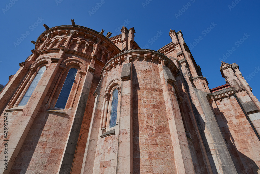Obraz premium Basilica of Santa María la Real de Covadonga (Cuadonga) in Asturias (Asturies). Neo-Romanesque style temple designed by Roberto Frassinelli and built entirely in pink limestone.