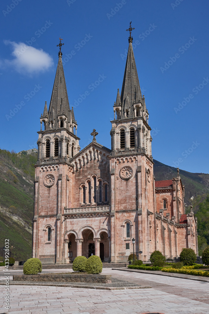 Basilica of Santa María la Real de Covadonga (Cuadonga) in Asturias (Asturies). Neo-Romanesque style temple designed by Roberto Frassinelli and built entirely in pink limestone.