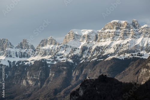 Steep snow-covered mountain flanks of the Churfirsten in Switzerland, Walenstadt, St.Gallen