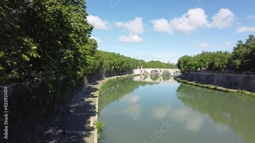 Beautiful view from Ponte Sisto in Rome, with the Saint Peters Basilica dome in the background. Italy. photo