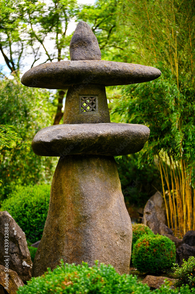 Japanese stone lamp decoration in the park. Japanese stone lamp decoration in the park.