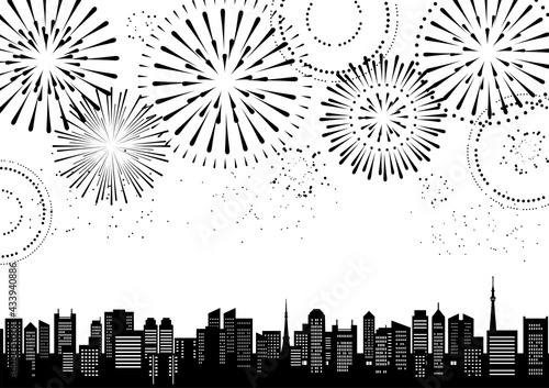 花火のあがる都市風景のイラスト（モノクロのシルエット）