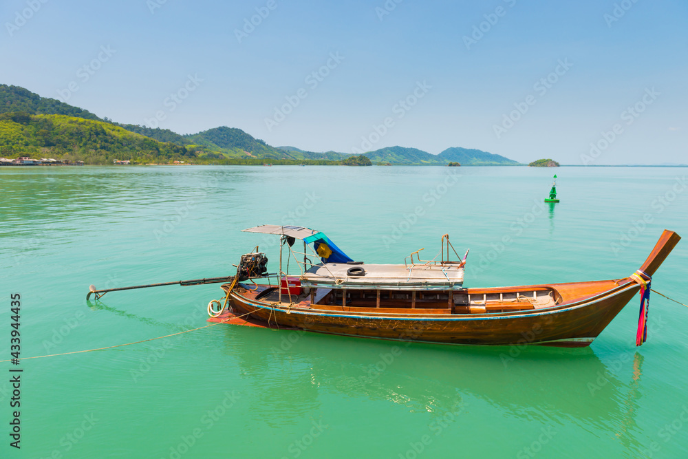 Traditional Thai boat with long tail. Sea boat landscape