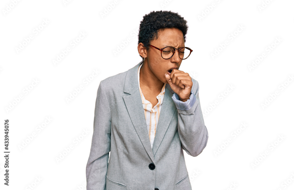 © Krakenimages.com - Young african american woman wearing business clothes feeling unwell and coughing as symptom for cold or bronchitis. health care concept.