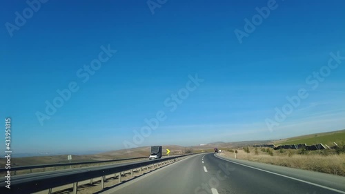 Hyper lapse driving ring road inside the car.