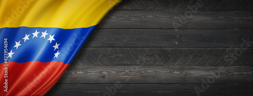 Venezuelan flag on black wood wall banner