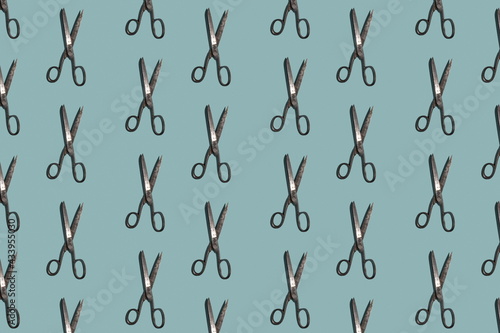 Seamless colorful pattern of Sewing Scissors on blue color background