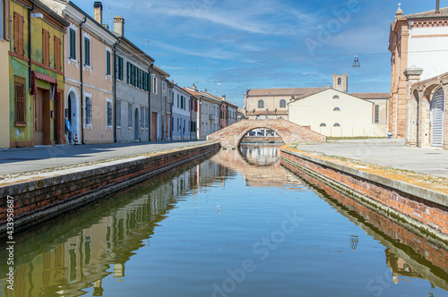 
Comacchio, Italy - often compared to Venice for the canals and the architecture, Comacchio displays one of the most characteristic old towns in Emilia Romagna photo