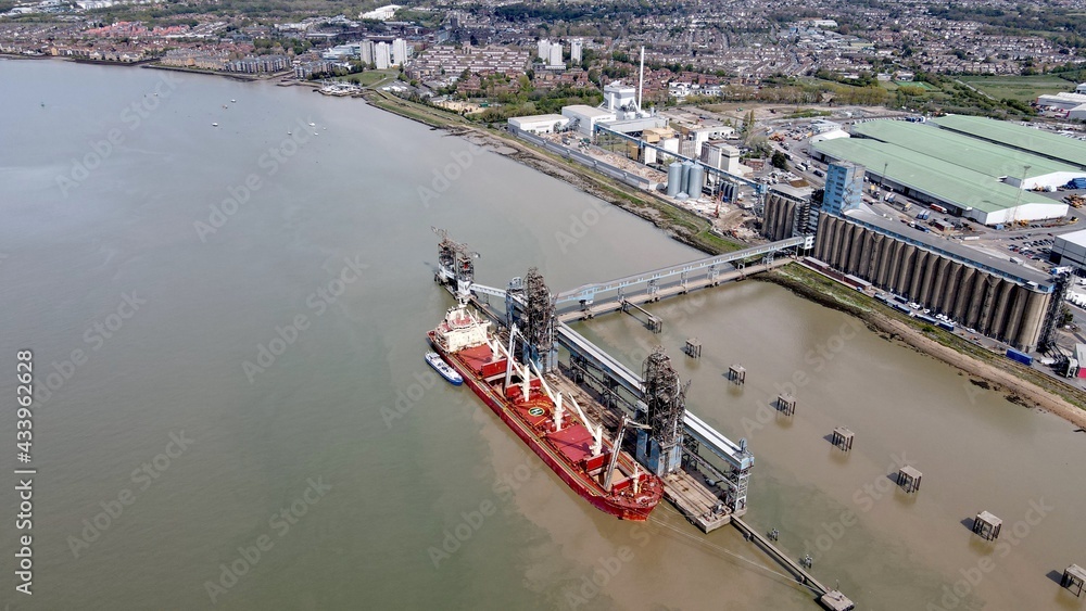 Tilbury Docks Essex ships loading , unloading UK Aerial footage 4K.
