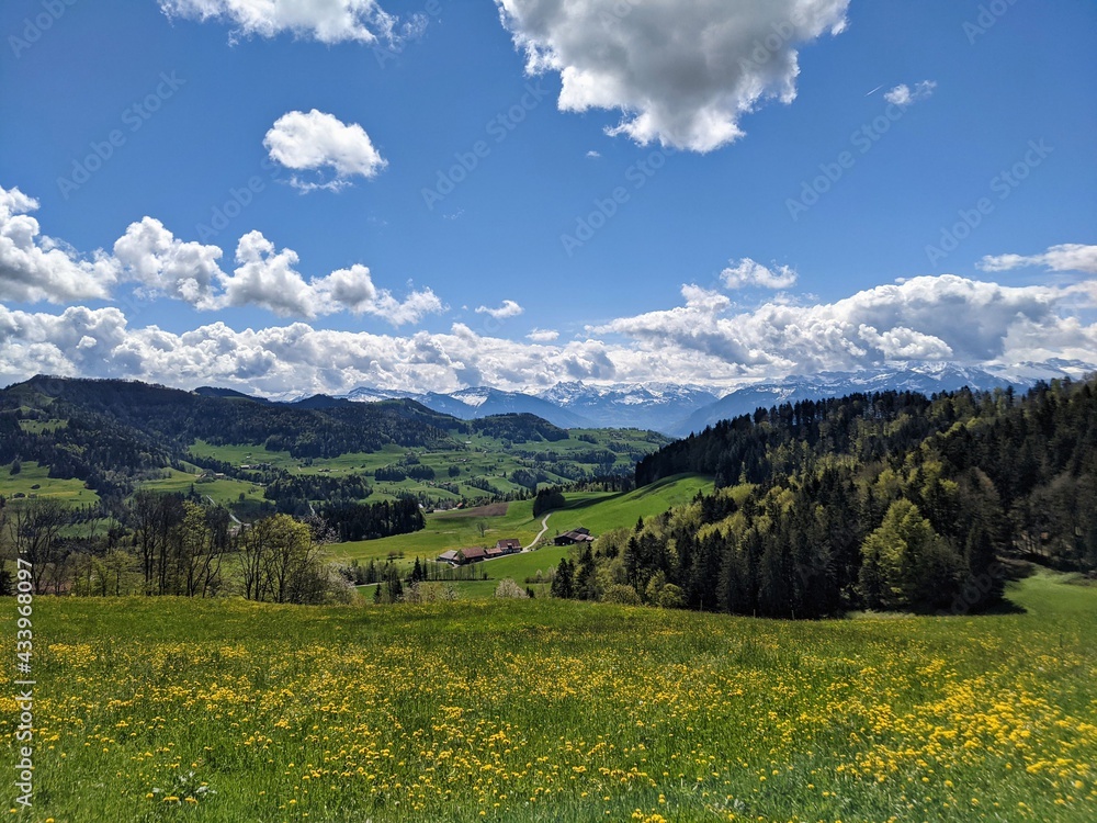 View in the Zurich Oberland of the surrounding hills in this beautiful spring season. foresight in the mountains. Swiss