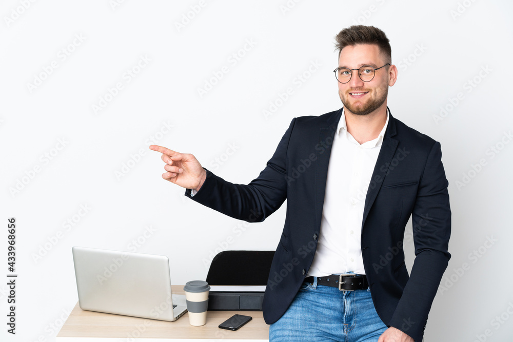 Russian man in a office isolated on white background pointing finger to the side Russian man in a office isolated on white background pointing finger to the side