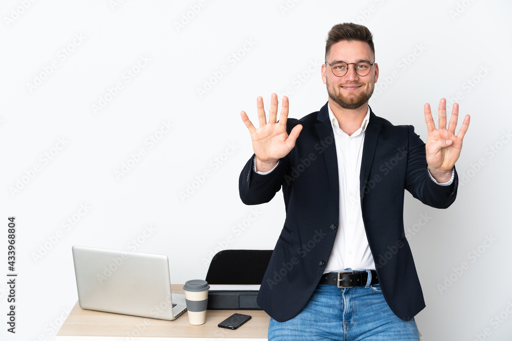 Russian man in a office isolated on white background counting nine with fingers Russian man in a office isolated on white background counting nine with fingers