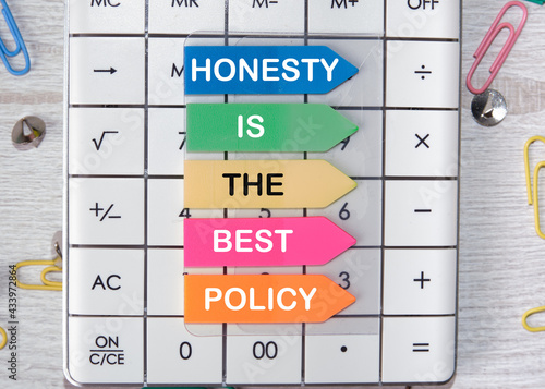 Honesty Is The Best Policy Message. a note on colored stickers on a white calculator