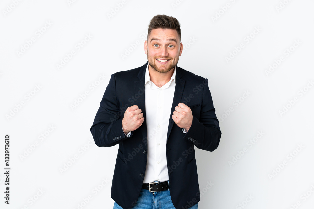 Young Russian business man isolated on white background celebrating a victory Young Russian business man isolated on white background celebrating a victory