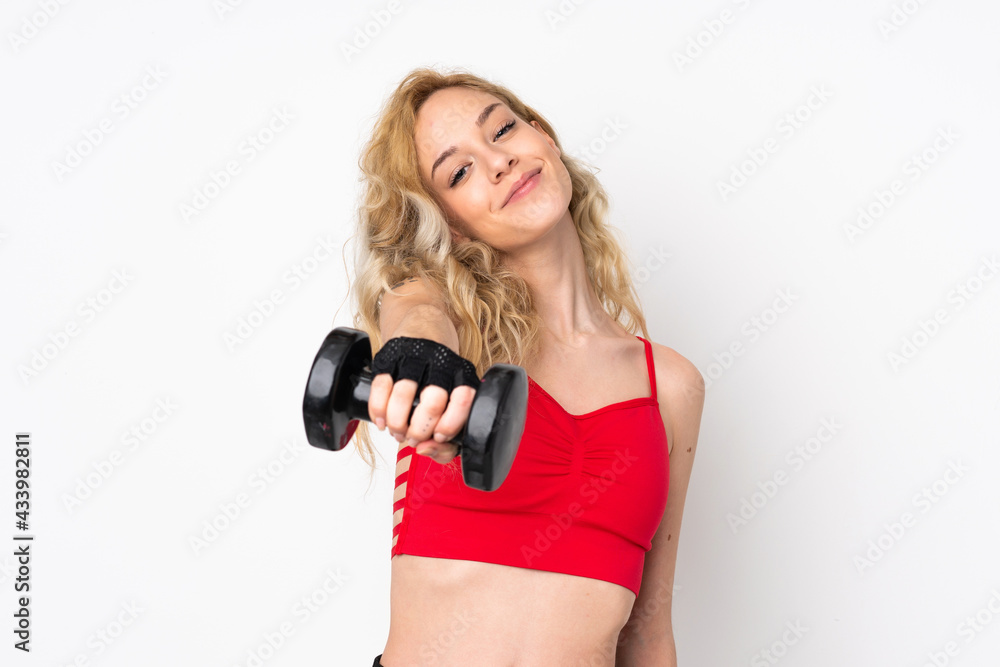 Young blonde woman isolated on white background making weightlifting Young blonde woman isolated on white background making weightlifting