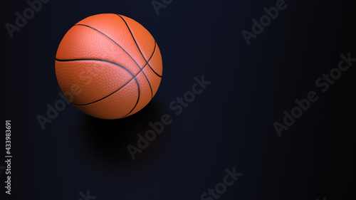3D rendering. A basketball on a dark background. A soft shadow in the reflection. Team sports game with a ball. Free space for insertion. 3D illustration.
