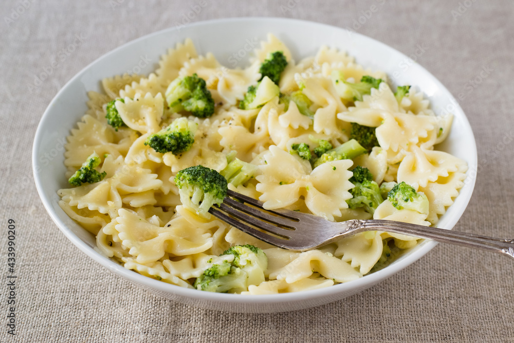 Pasta with broccoli on textile background Pasta with broccoli on textile background