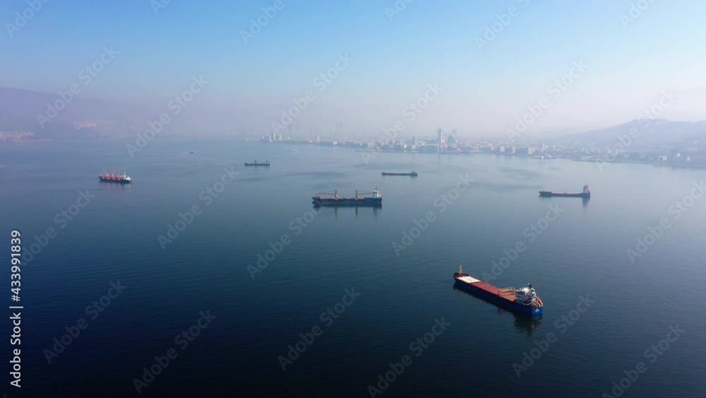Aerial view of seascape with resort city on the horizon. Aerial view of seascape with resort city on the horizon.