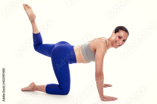 sporty woman doing gluteal exercise