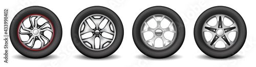 Car rims set with rubber tires and chromed modern disks for vehicle wheel protection