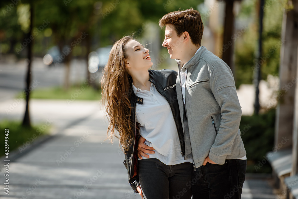 Young happy beautiful couple in the street. Young happy beautiful couple in the street.