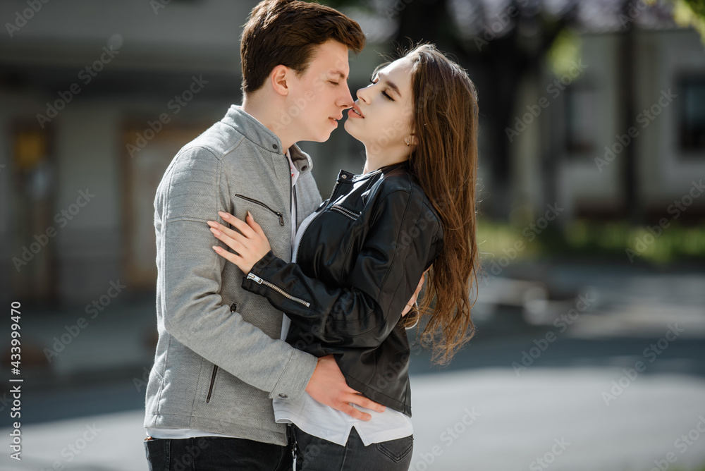 Young happy beautiful couple in the street. Young happy beautiful couple in the street.