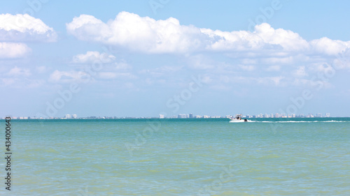 Boat rides over San Carlos Bay background Fort Myers Beach
