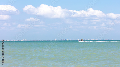 Obraz na płótnie Boat rides over San Carlos Bay background Fort Myers Beach w salonie