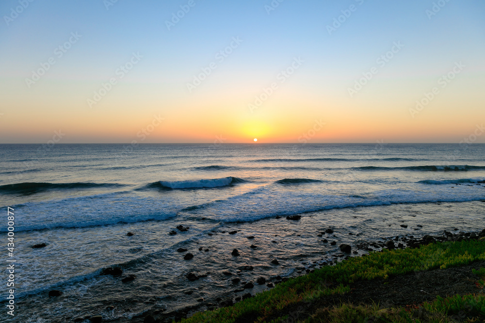 Sunset in Gran Canaria on Canary Island beach and waves