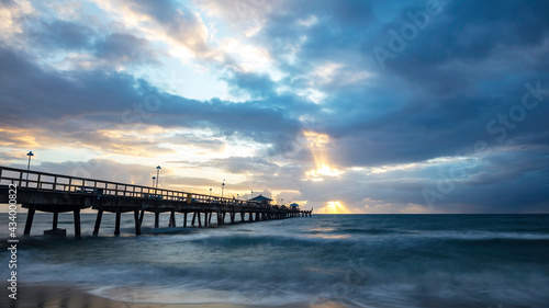 Obraz na płótnie Pompano Beach Pier Broward County Florida stormy weather and sunrise w salonie