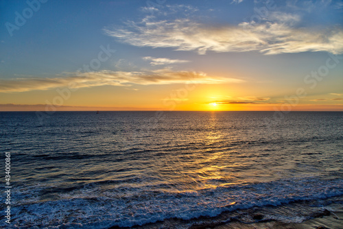 Sunset in Gran Canaria on Canary Island and waves