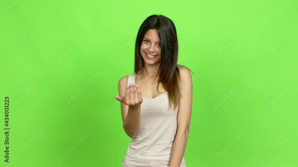 Young woman presenting and inviting to come with hand over isolated background Young woman presenting and inviting to come with hand over isolated background