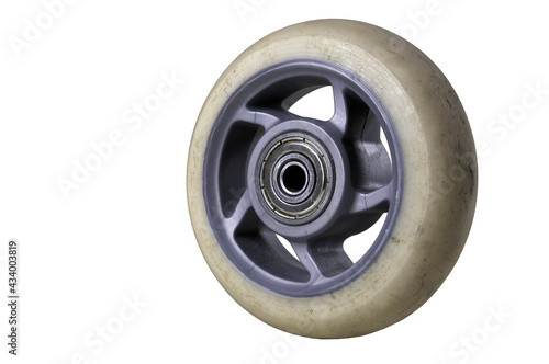 Worn out rubber wheel from roller skates. Spare parts for speed skates. photo