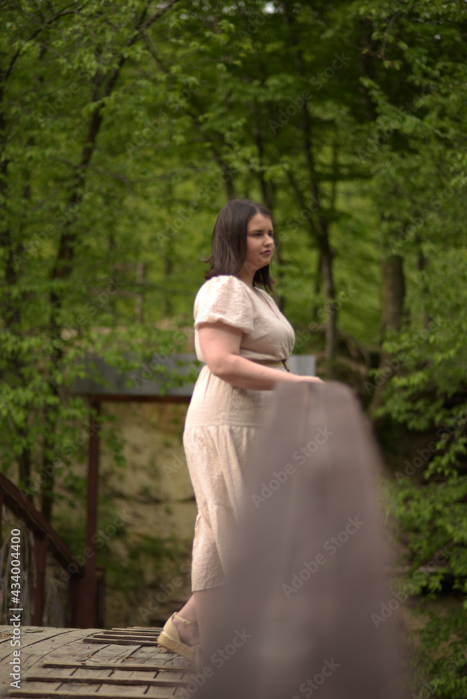 Young girl with a beautiful smile in nature Young girl with a beautiful smile in nature