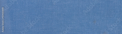 texture of dark blue jeans denim fabric textile background 