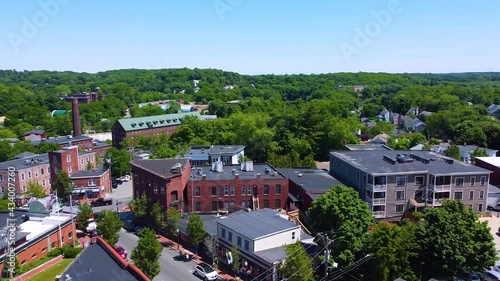 Amesbury historic downtown aerial view on Main Street including Market Square, Market Street Baptist Church and historic mill buildings in city of Amesbury, Massachusetts MA, USA.   photo