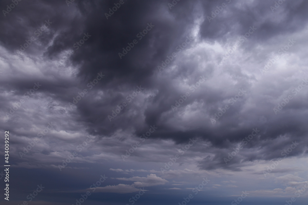 Epic storm sky with dark rainy clouds abstract background texture, thunderstorm