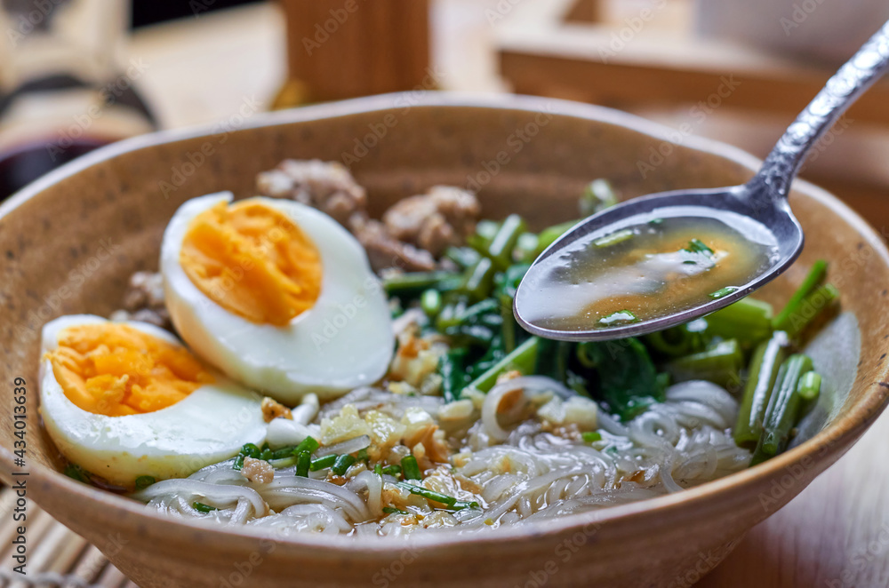 The tasty look noodle soup serving in a bowl