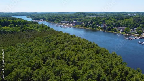 Merrimack River aerial view in summer between city of Amesbury and Newburyport near river mouth to Atlantic, Massachusetts MA, USA.  photo