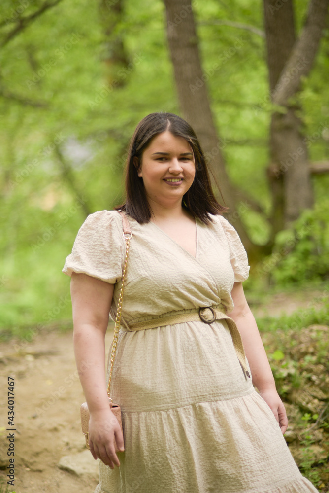 Young girl with a beautiful smile in nature Young girl with a beautiful smile in nature