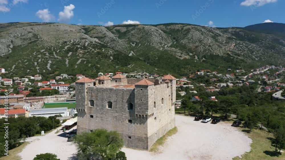 Nehaj Fortress On The Hill With Senj Town, Mountain, And Adriatic Sea Landscape At Daytime In Croatia. - aerial Nehaj Fortress On The Hill With Senj Town, Mountain, And Adriatic Sea Landscape At Daytime In Croatia. - aerial