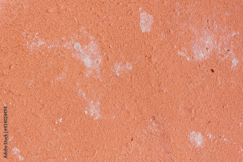 The texture of terracotta ceramics with cracks and efflorescence. Close-up.