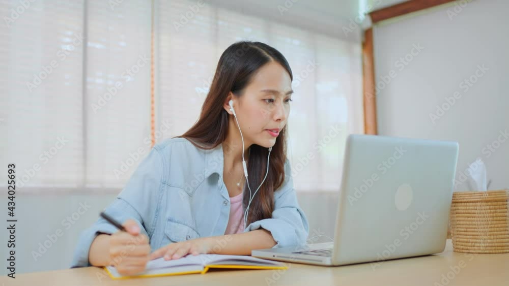 Asian homeschool girl learning online at home during COVID-19 pandemic Asian homeschool girl learning online at home during COVID-19 pandemic